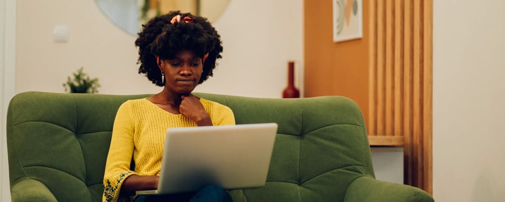 Frustrated woman navigating a website